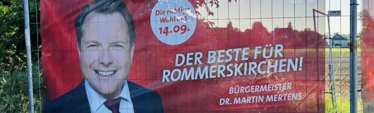 Wahlplakat der SPD Rommerskirchen Bürgermeister Martin Mertens, daneben der Text: "Der Beste für Rommerskirchen!"