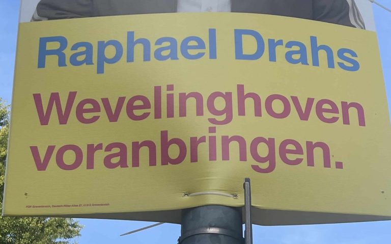 Plakatausschnitt der FDP Nur Text: "Raphael Drahs - Wevelinghoven voranbringen"